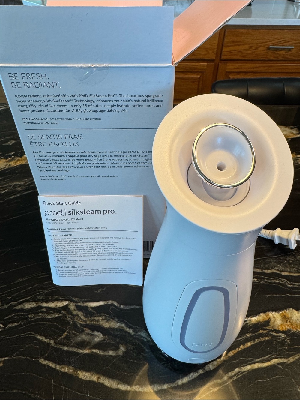 PMD Facial Steamer in White with Light Blue Accent